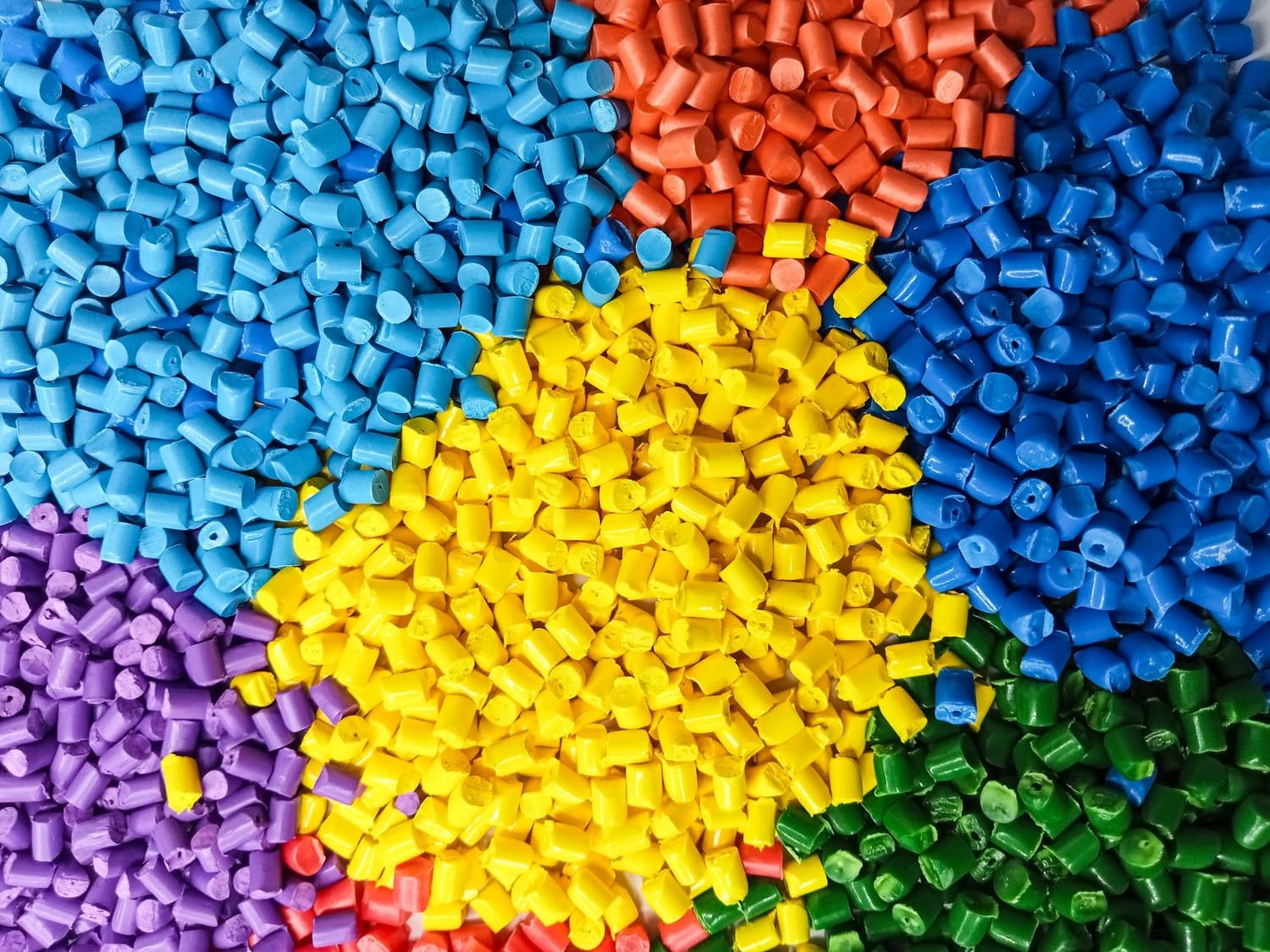Colourful polymer granules across the Shreegopal Polychem product range
